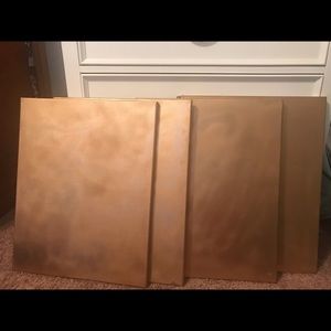 4 Gold spray painted canvas